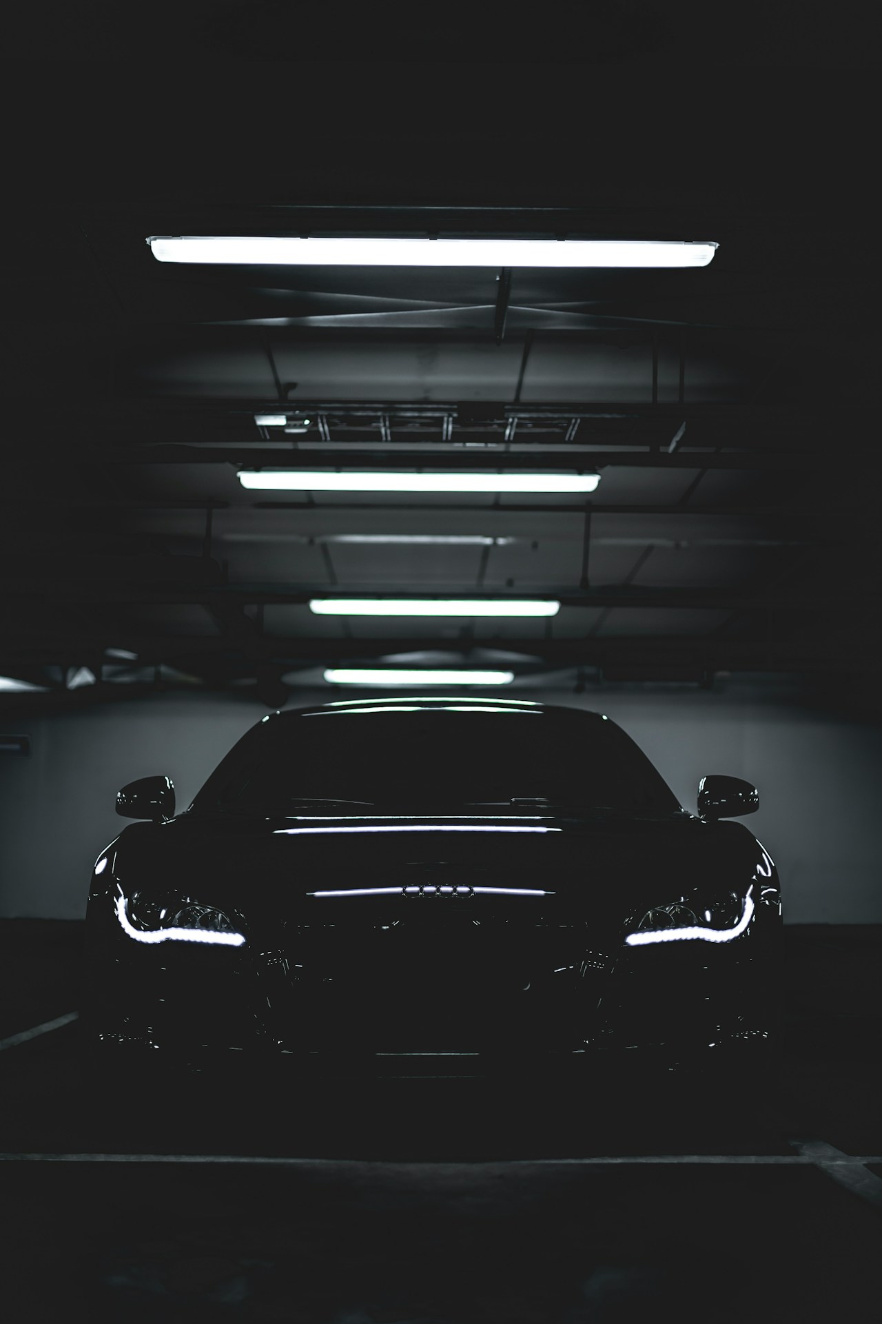 Black Audi detailed, parked in a garage